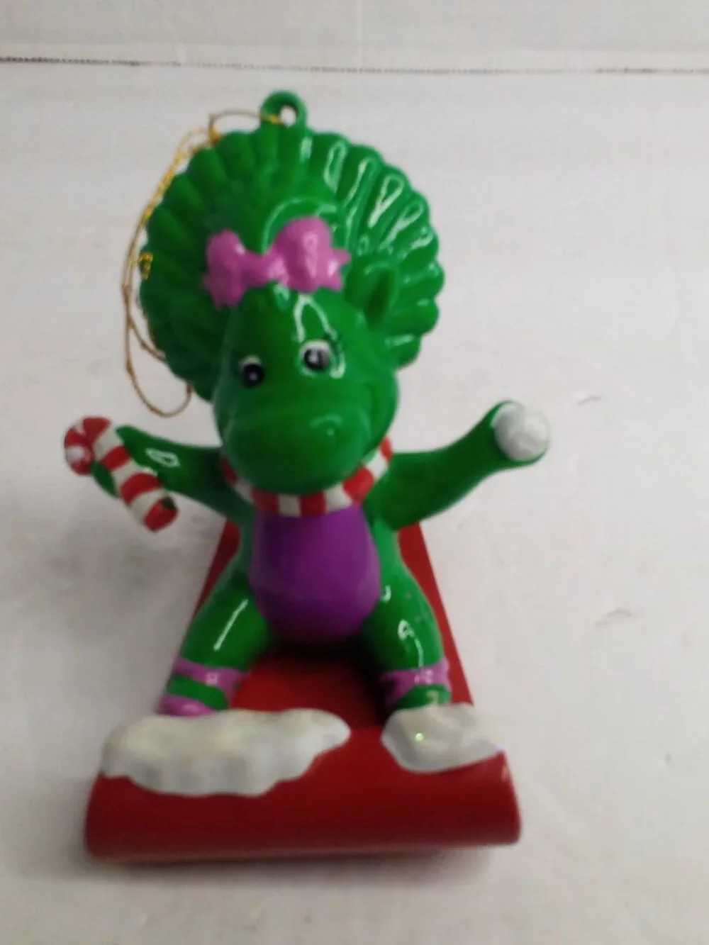 Baby Bop Sledding Christmas Ornament Plastic Barney 2000 Lyons Partnership
